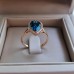 Δαχτυλίδι από ροζ χρυσό Κ18 με διαμάντια και London Blue Topaz